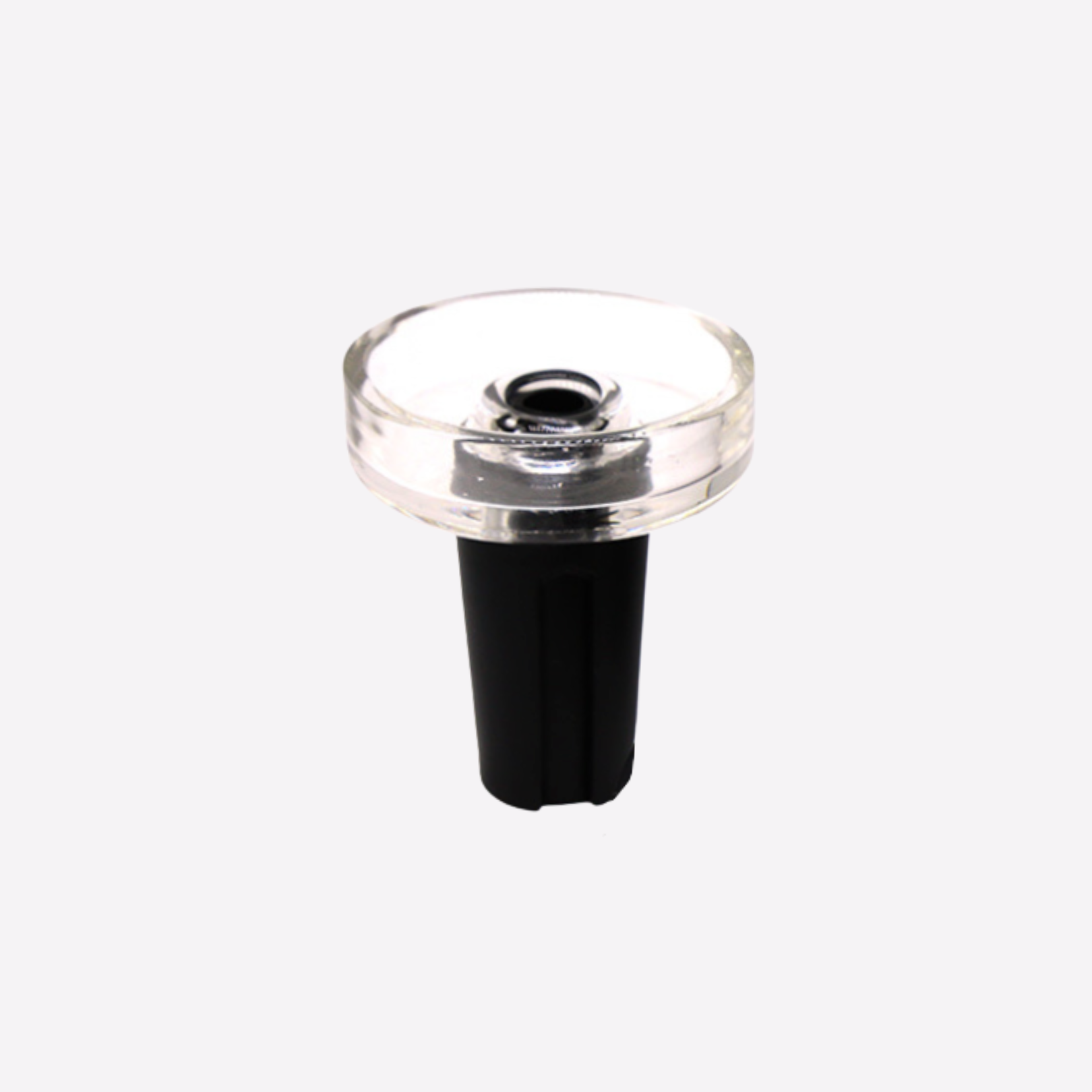 Clear glass component with black base on a white background bowl