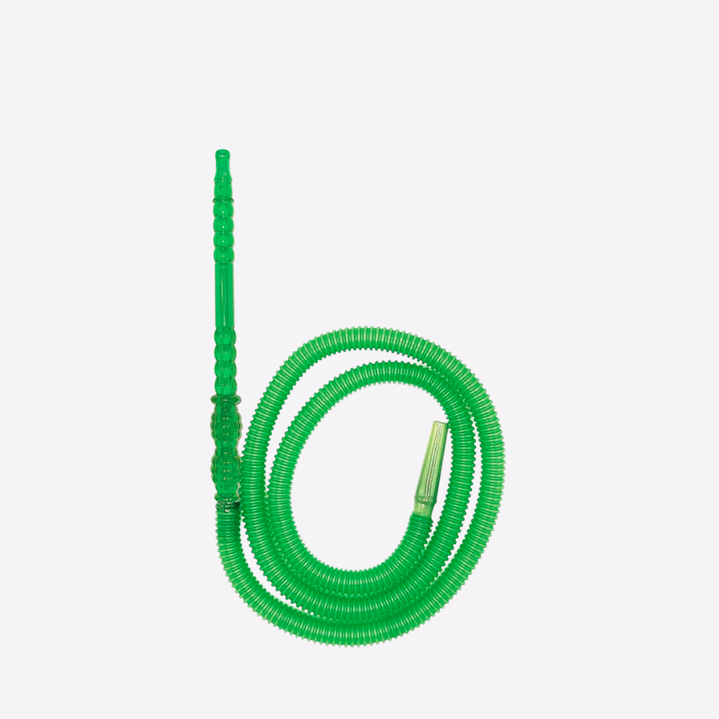 Coiled green hose on a white background