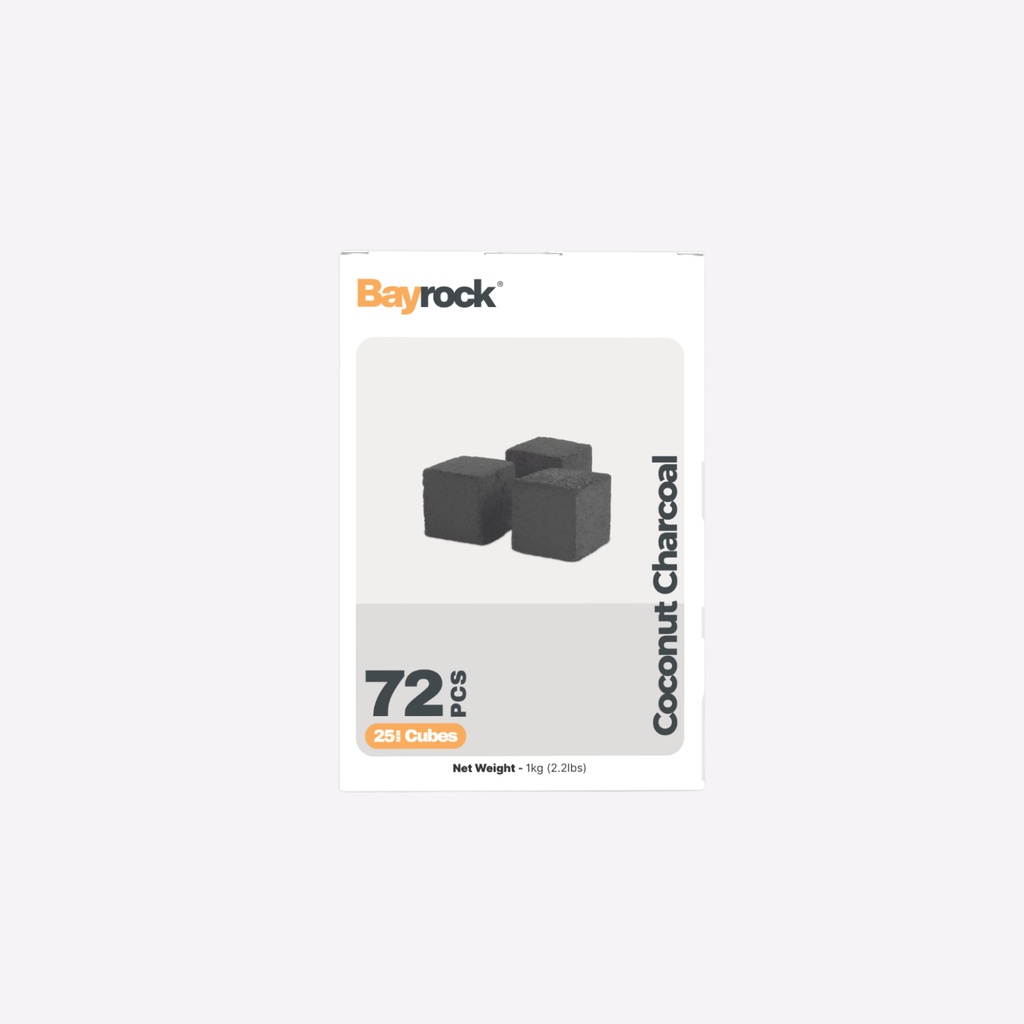 Bayrock coconut charcoal packaging with two charcoal cubes on a white background