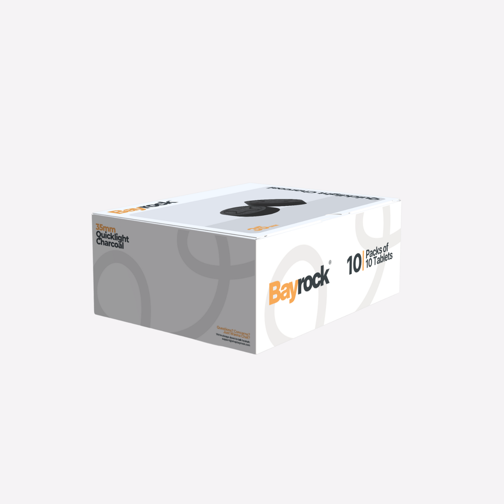 Box of Bayrock Quicklime Charcoal on a white background
