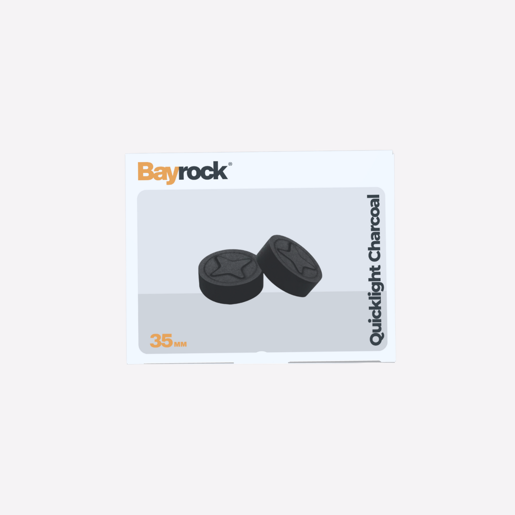 Bayrock Quicklight Charcoal packaging with two charcoal tablets on a white background