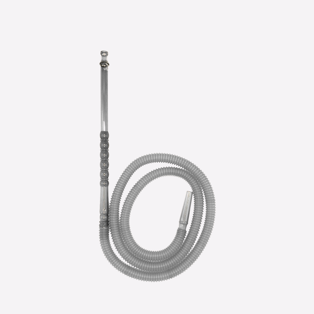 Coiled hose with a nozzle on a light gray background